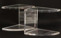 Lot 512 - A pair of lucite and glass quarter elliptical lamp tables