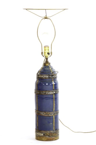 Lot 269 - A Marrakesh blue glazed pottery table lamp of cylindrical form with metal mounts