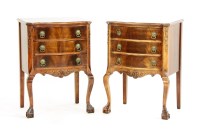 Lot 520 - A pair of mahogany serpentine fronted bedside chests