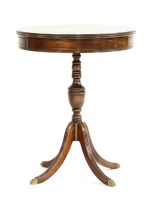 Lot 521 - A mahogany lamp table