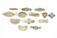 Lot 72 - A collection of silver name brooches