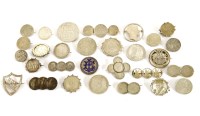 Lot 101 - A collection of coin set brooches
