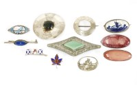 Lot 119 - Three Ruskin style brooches