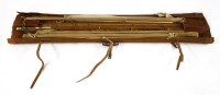 Lot 339A - Fishing: a folding canvas rod holdall with four rods