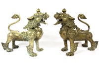 Lot 473 - A pair of early 20th century Thai brass temple lions