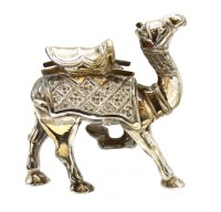 Lot 258 - A white metal model of a camel