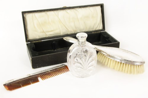 Lot 212 - A silver mounted scent bottle