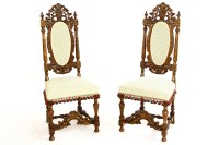 Lot 753 - A pair of 19th century carved walnut high back side chairs