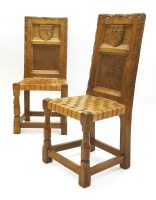 Lot 199 - A pair of Robert 'Mouseman' Thompson oak hall chairs