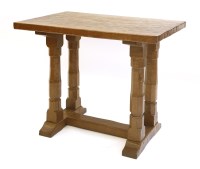 Lot 184 - A Robert 'Mouseman' Thompson oak side table or extension