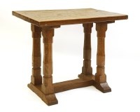 Lot 185 - A Robert 'Mouseman' Thompson oak side table or extension