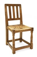 Lot 165 - A Robert ‘Mouseman’ Thompson oak chair