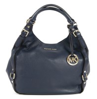 Lot 1111 - A Michael Kors navy blue leather handbag