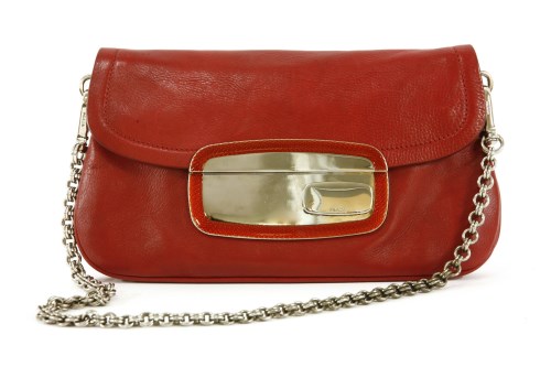 1130 - A Prada red leather clutch bag