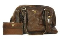 Lot 1210 - A Prada chocolate brown leather handbag