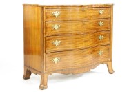 Lot 527 - A late George III inlaid mahogany serpentine chest