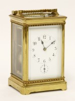 Lot 242 - A Tiffany & Co brass carriage clock