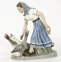 Lot 253 - A Copenhagen group of a girl with geese