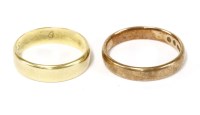 Lot 48 - An 18ct gold flat section wedding ring