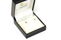 Lot 11 - A pair of 18ct white gold single stone brilliant cut diamond stud earrings