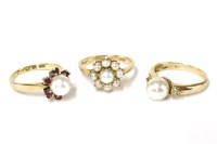 Lot 17 - A 9ct gold single stone cultured pearl and diamond trefoil shoulder ring