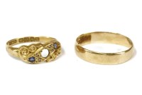 Lot 26 - An 18ct gold sapphire and diamond ring