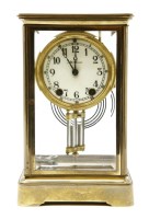 Lot 479 - A late 19th century brass cased four glass mantel clock