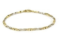 Lot 65 - A two colour gold bracelet
