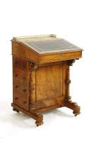 Lot 765 - A Victorian walnut Davenport