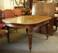 Lot 625 - A large Victorian and later extending dining table