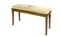 Lot 712 - A French empire style walnut duet stool