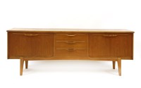 Lot 612 - A teak sideboard