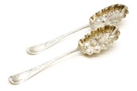 Lot 175 - A pair of Georgian silver berry spoons