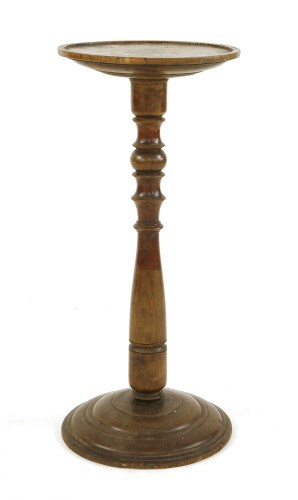 Lot 771 - An elm candle stand