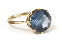 Lot 57 - A gold single stone synthetic spinel ring