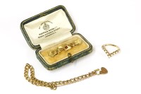 Lot 45 - A 9ct gold opal cabochon half wishbone ring
