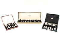 Lot 186 - A cased set of six silver grapefruit spoons