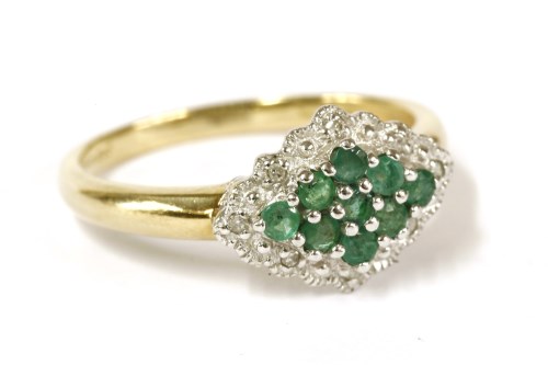 Lot 16 - A 9ct gold emerald and diamond lozenge shaped cluster ring