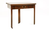 Lot 718 - A George III mahogany fold over tea table