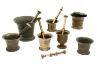 Lot 431 - A collection of six brass and bronze pestle and mortars