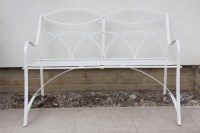 Lot 809 - A Regency style white painted iron garden seat