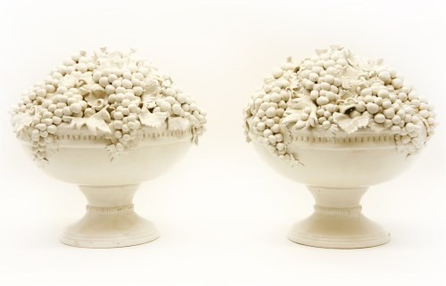 Lot 363 - A pair of 20th century Italian white glazed pottery ornaments