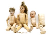 Lot 332 - A collection of bisque head dolls