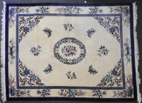 Lot 663 - A blue and white Chinese carpet