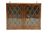 Lot 690 - A 19th century mahogany hanging cabinet