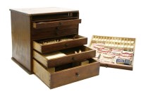Lot 422 - A stained pine collectors chest filled with dentists samples of teeth
