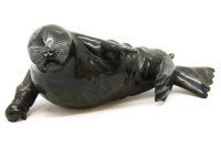 Lot 469 - An Inuit carved stone figure of a walrus