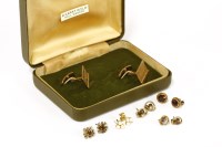 Lot 118 - A pair of 9ct gold polished and bark textured swivel cufflinks