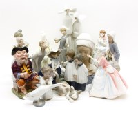 Lot 406 - A collection of ceramic figures