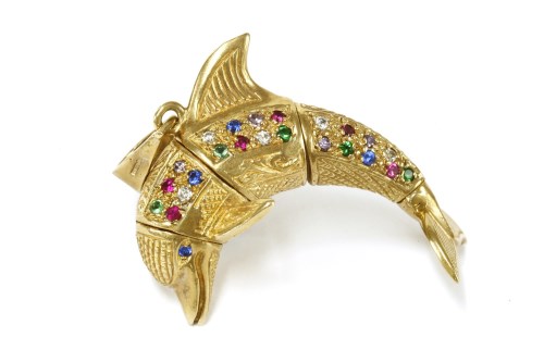 Lot 27 - A 9ct gold articulated dolphin pendant